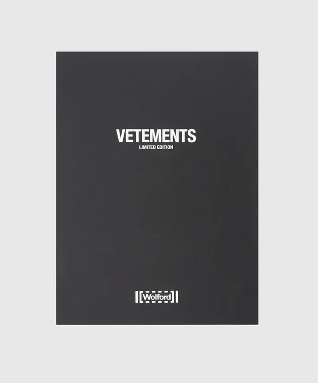 Vetements Black tights in a logo pattern collaboration with Wolford