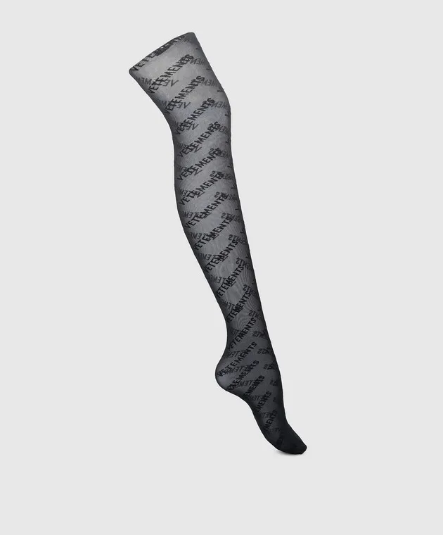 Vetements Black tights in a logo pattern collaboration with Wolford